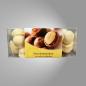 Mobile Preview: Geröstete Macadamia-Nüsse mit weißer Schokolade umhüllt.